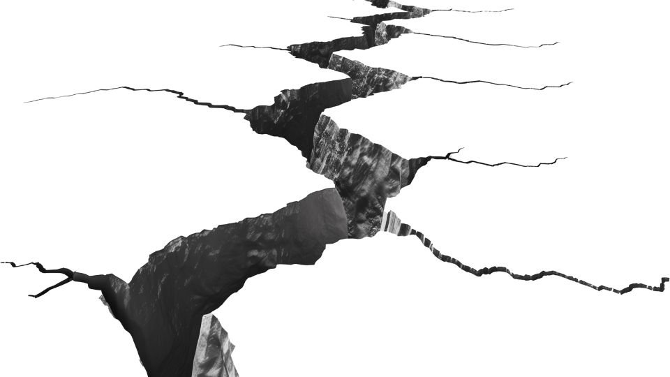 Egy mély repedés a föld felszínén, amely az álomfejtés szimbólumát jelképezi.